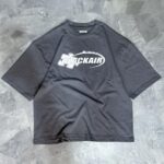 REMERA PUZZLE (GRIS)