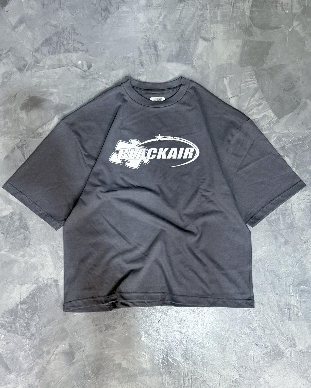 WhatsApp Image 2025-11-03 at 3.26.11 PM (3) REMERA PUZZLE (GRIS) - Imagen 1